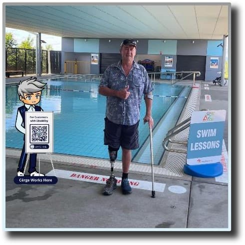 A smiling woman and a man stand beside a Cérge cartoon cutout with a QR sign. A smiling woman and a man stand beside a Cérge cartoon cutout with a QR sign.